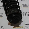 Амортизатор передній лівий в зборі 22214601