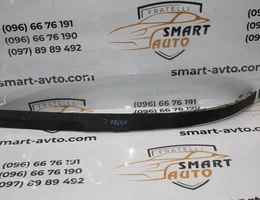 Молдинг (губа) переднього бампера лівий 13121998