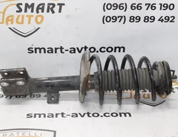 Амортизатор передній лівий в зборі 9684067780