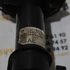 Амортизатор передній лівий в зборі 22214601
