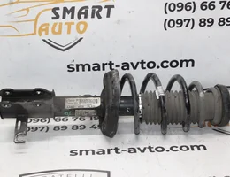 Амортизатор передній правий в зборі AA0B 13354028
