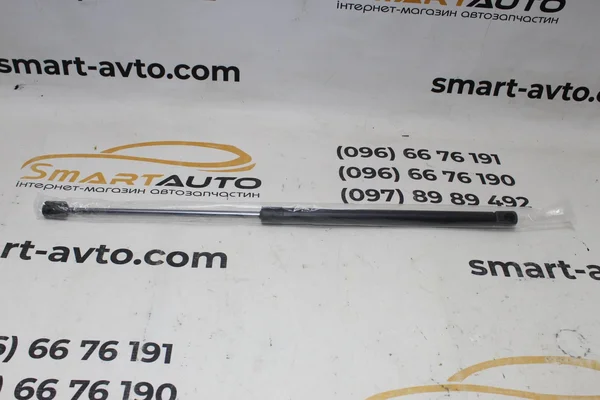 Амортизатор капоту 8063404