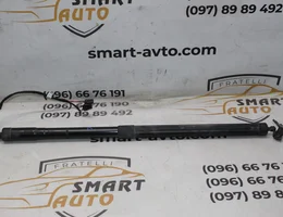 Амортизатор кришки багажника правий (електричний) 9804069780