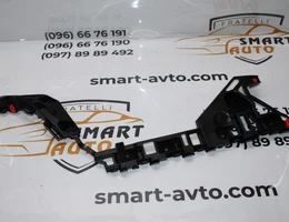 Кронштейн заднього бампера лівий 20877797