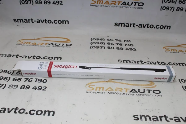 Амортизатор капоту 8063404