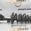 Амортизатор передній лівий в зборі 13474017