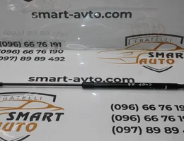 Амортизатор кришки багажника (відкривне вікно) 9654438880