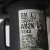 Амортизатор передній лівий в зборі 13412611